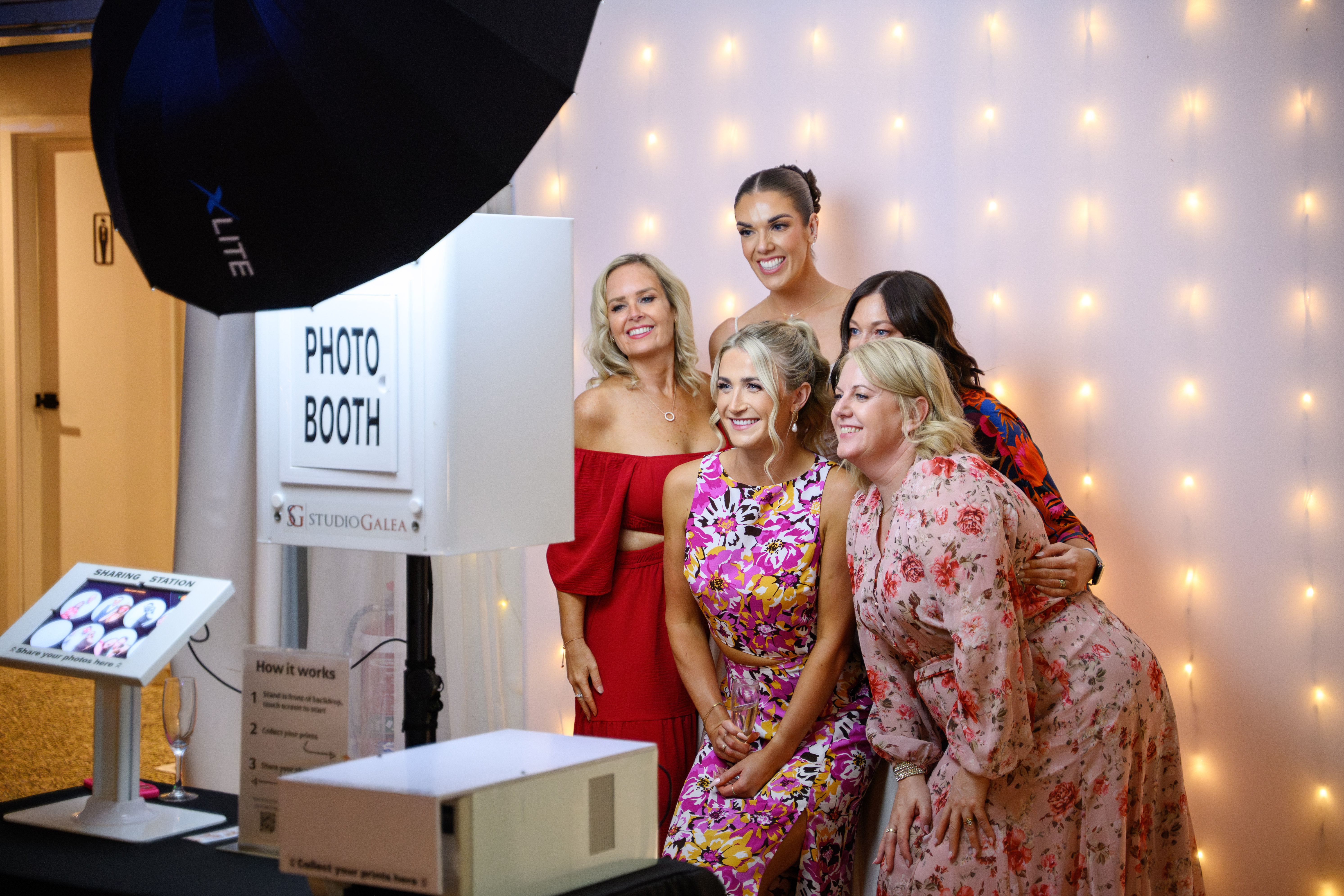 Friends enjoying the photo booth